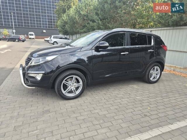Чорний Кіа Sportage, об'ємом двигуна 2 л та пробігом 174 тис. км за 16799 $, фото 2 на Automoto.ua