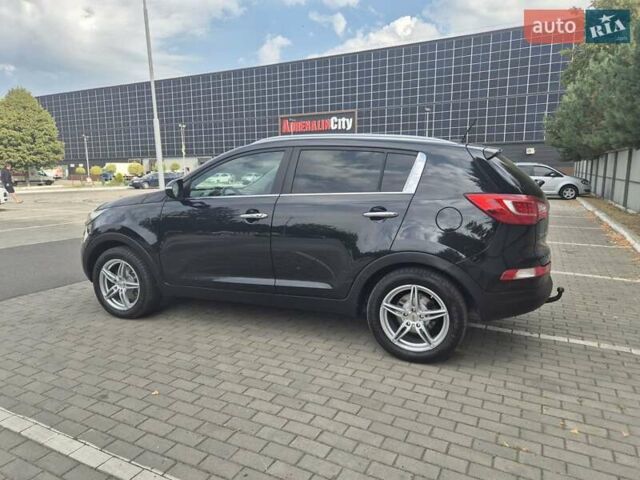 Чорний Кіа Sportage, об'ємом двигуна 2 л та пробігом 174 тис. км за 16799 $, фото 7 на Automoto.ua