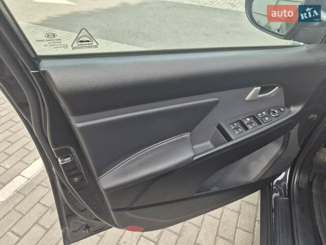 Чорний Кіа Sportage, об'ємом двигуна 2 л та пробігом 174 тис. км за 16799 $, фото 34 на Automoto.ua