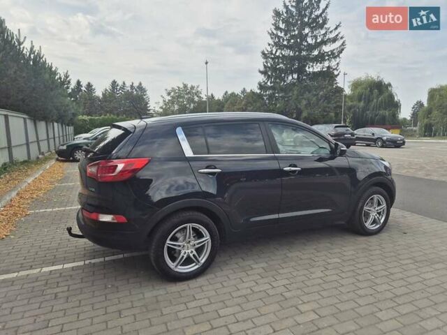 Чорний Кіа Sportage, об'ємом двигуна 2 л та пробігом 174 тис. км за 16799 $, фото 12 на Automoto.ua