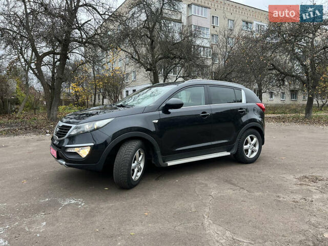Черный Киа Sportage, объемом двигателя 1.6 л и пробегом 185 тыс. км за 11900 $, фото 2 на Automoto.ua