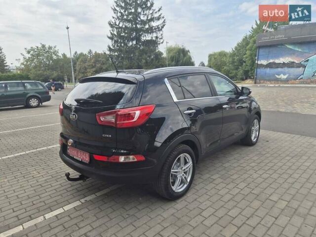 Чорний Кіа Sportage, об'ємом двигуна 2 л та пробігом 174 тис. км за 16799 $, фото 14 на Automoto.ua