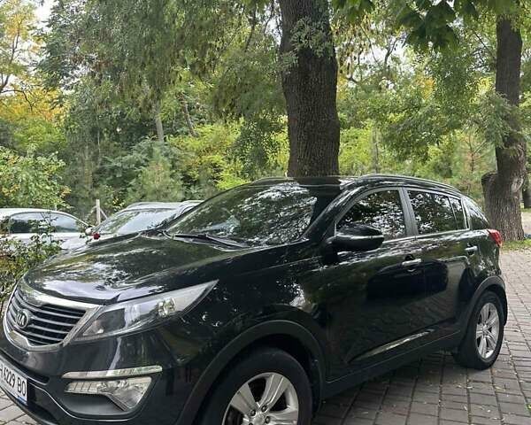 Чорний Кіа Sportage, об'ємом двигуна 2 л та пробігом 160 тис. км за 14500 $, фото 5 на Automoto.ua