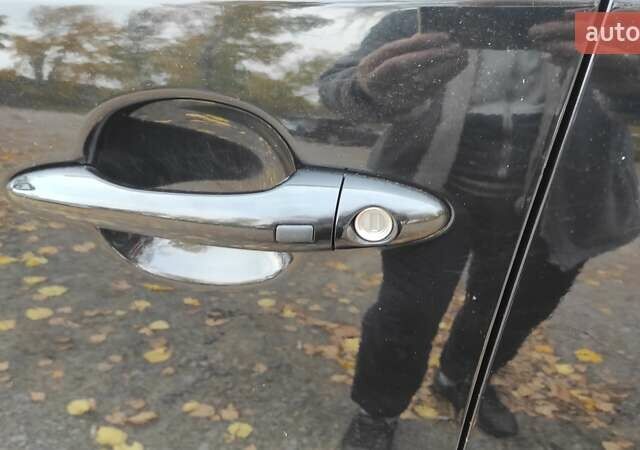 Черный Киа Sportage, объемом двигателя 2 л и пробегом 159 тыс. км за 15600 $, фото 10 на Automoto.ua