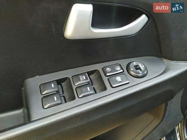 Черный Киа Sportage, объемом двигателя 1.69 л и пробегом 213 тыс. км за 13350 $, фото 28 на Automoto.ua