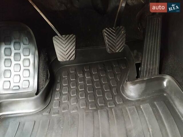 Черный Киа Sportage, объемом двигателя 1.69 л и пробегом 213 тыс. км за 13350 $, фото 54 на Automoto.ua