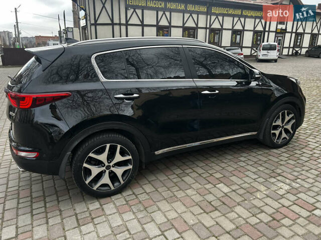 Чорний Кіа Sportage, об'ємом двигуна 2 л та пробігом 176 тис. км за 17600 $, фото 28 на Automoto.ua