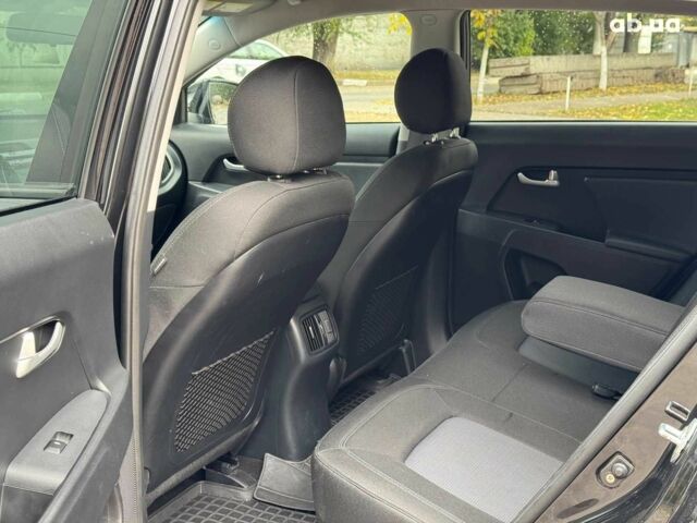 Черный Киа Sportage, объемом двигателя 2.4 л и пробегом 117 тыс. км за 12690 $, фото 12 на Automoto.ua