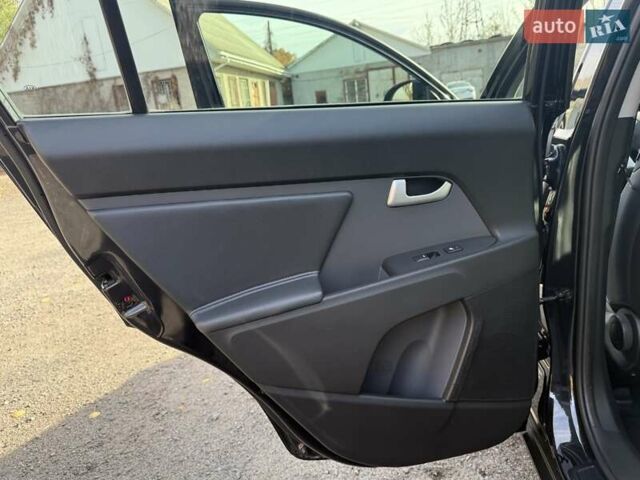 Чорний Кіа Sportage, об'ємом двигуна 2 л та пробігом 147 тис. км за 16900 $, фото 38 на Automoto.ua