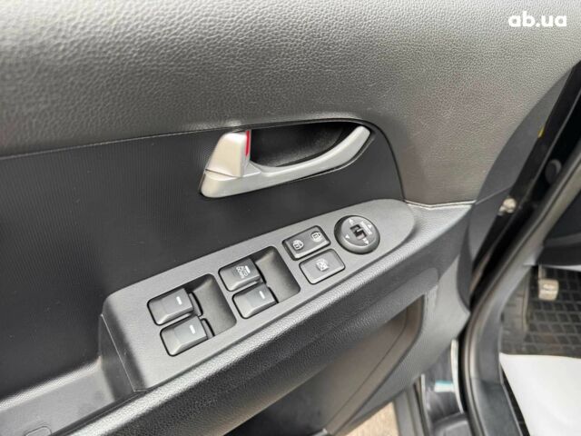 Черный Киа Sportage, объемом двигателя 2.4 л и пробегом 117 тыс. км за 12690 $, фото 18 на Automoto.ua