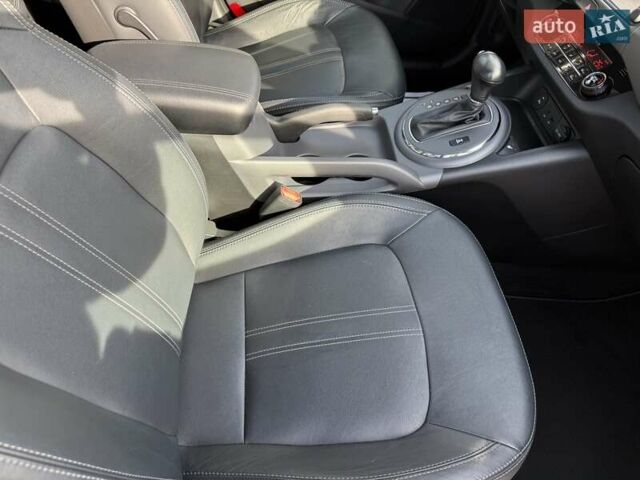 Чорний Кіа Sportage, об'ємом двигуна 2 л та пробігом 147 тис. км за 16900 $, фото 37 на Automoto.ua