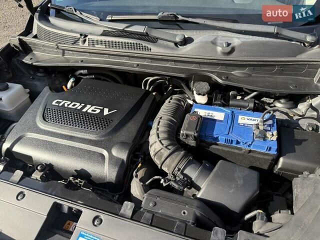 Чорний Кіа Sportage, об'ємом двигуна 2 л та пробігом 147 тис. км за 16900 $, фото 56 на Automoto.ua