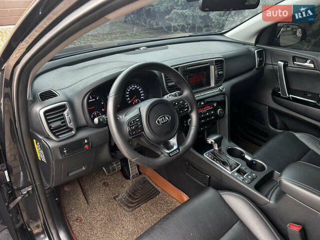 Чорний Кіа Sportage, об'ємом двигуна 2 л та пробігом 176 тис. км за 17600 $, фото 9 на Automoto.ua