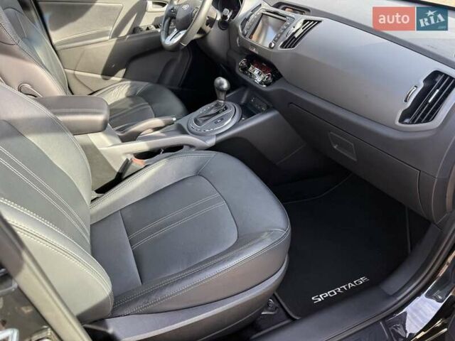 Чорний Кіа Sportage, об'ємом двигуна 2 л та пробігом 147 тис. км за 16900 $, фото 39 на Automoto.ua
