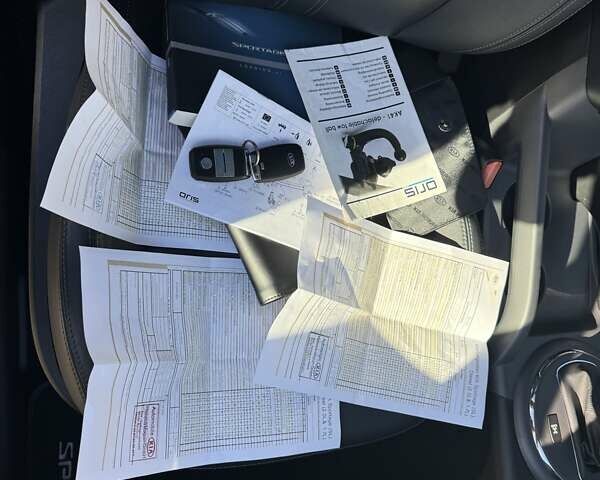 Чорний Кіа Sportage, об'ємом двигуна 2 л та пробігом 147 тис. км за 16900 $, фото 58 на Automoto.ua