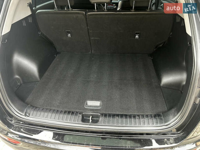 Чорний Кіа Sportage, об'ємом двигуна 2 л та пробігом 176 тис. км за 17600 $, фото 13 на Automoto.ua