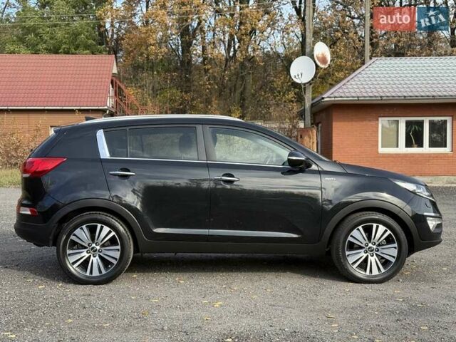 Чорний Кіа Sportage, об'ємом двигуна 2 л та пробігом 147 тис. км за 16900 $, фото 14 на Automoto.ua