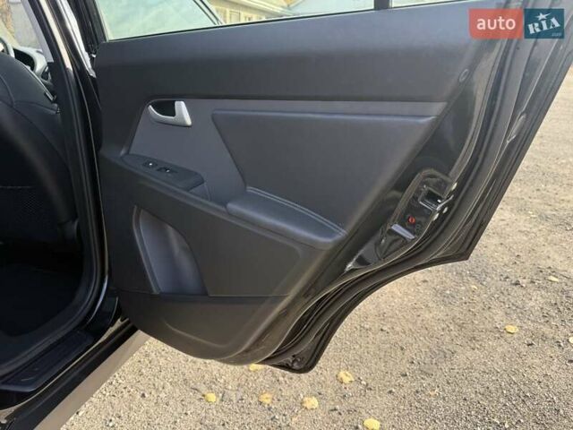 Чорний Кіа Sportage, об'ємом двигуна 2 л та пробігом 147 тис. км за 16900 $, фото 31 на Automoto.ua