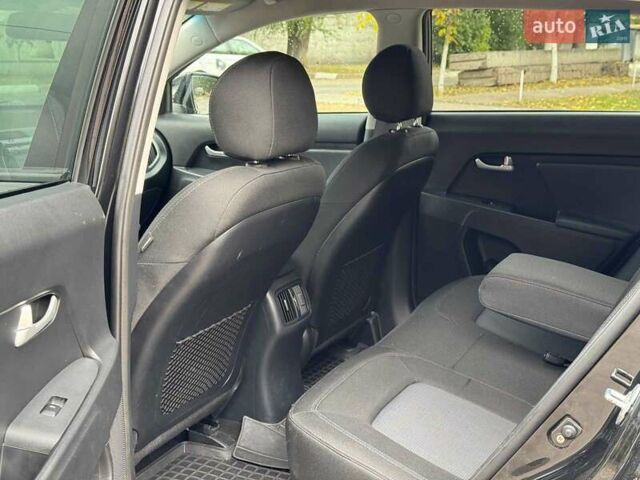 Черный Киа Sportage, объемом двигателя 2.4 л и пробегом 117 тыс. км за 12690 $, фото 12 на Automoto.ua