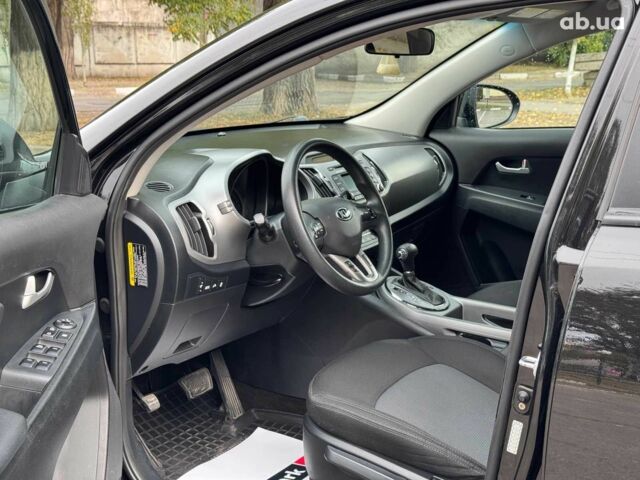 Черный Киа Sportage, объемом двигателя 2.4 л и пробегом 117 тыс. км за 12690 $, фото 11 на Automoto.ua