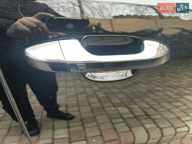 Чорний Кіа Sportage, об'ємом двигуна 2 л та пробігом 176 тис. км за 17600 $, фото 18 на Automoto.ua