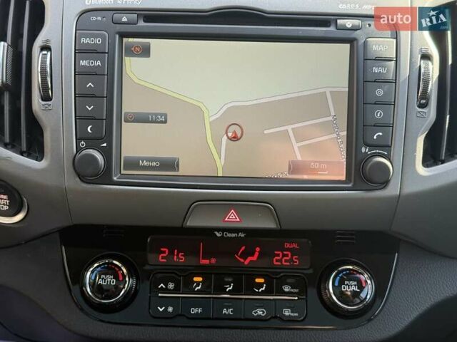 Чорний Кіа Sportage, об'ємом двигуна 2 л та пробігом 147 тис. км за 16900 $, фото 23 на Automoto.ua