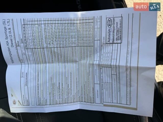 Чорний Кіа Sportage, об'ємом двигуна 2 л та пробігом 147 тис. км за 16900 $, фото 62 на Automoto.ua