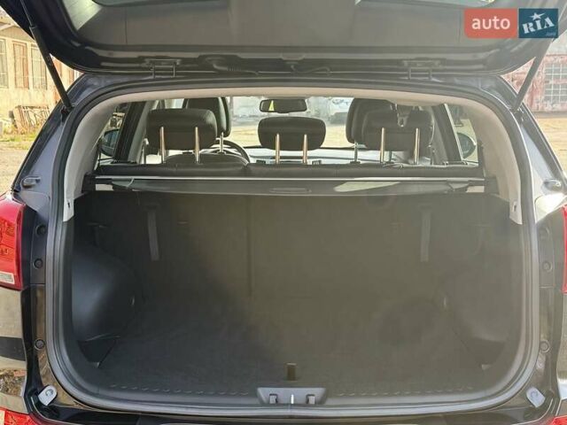Чорний Кіа Sportage, об'ємом двигуна 2 л та пробігом 147 тис. км за 16900 $, фото 25 на Automoto.ua