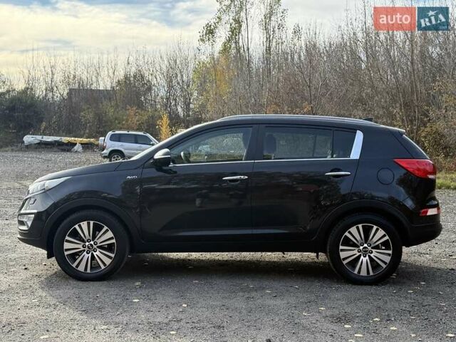 Чорний Кіа Sportage, об'ємом двигуна 2 л та пробігом 147 тис. км за 16900 $, фото 7 на Automoto.ua