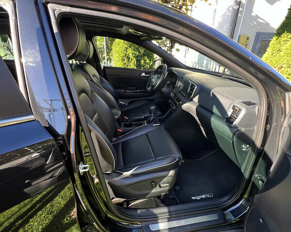 Черный Киа Sportage, объемом двигателя 2 л и пробегом 141 тыс. км за 18000 $, фото 14 на Automoto.ua