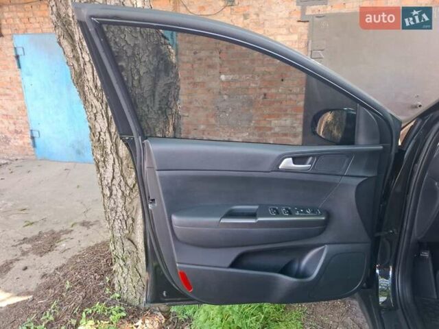 Черный Киа Sportage, объемом двигателя 2 л и пробегом 110 тыс. км за 17800 $, фото 11 на Automoto.ua