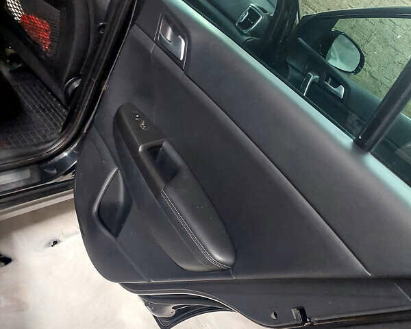 Чорний Кіа Sportage, об'ємом двигуна 2 л та пробігом 83 тис. км за 22000 $, фото 8 на Automoto.ua