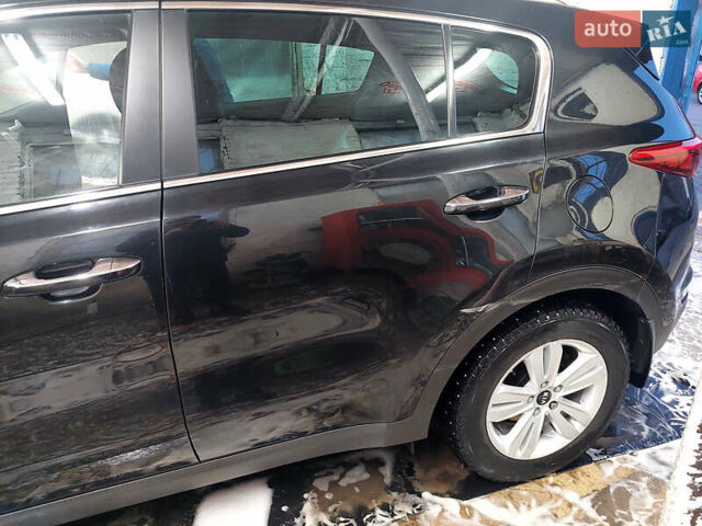 Чорний Кіа Sportage, об'ємом двигуна 2 л та пробігом 83 тис. км за 22000 $, фото 14 на Automoto.ua
