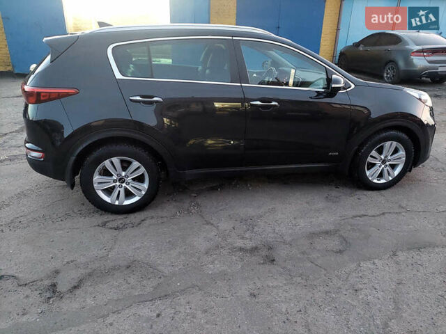 Чорний Кіа Sportage, об'ємом двигуна 2 л та пробігом 83 тис. км за 22000 $, фото 22 на Automoto.ua