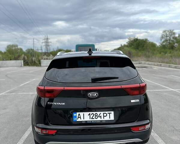 Чорний Кіа Sportage, об'ємом двигуна 2 л та пробігом 178 тис. км за 17900 $, фото 5 на Automoto.ua