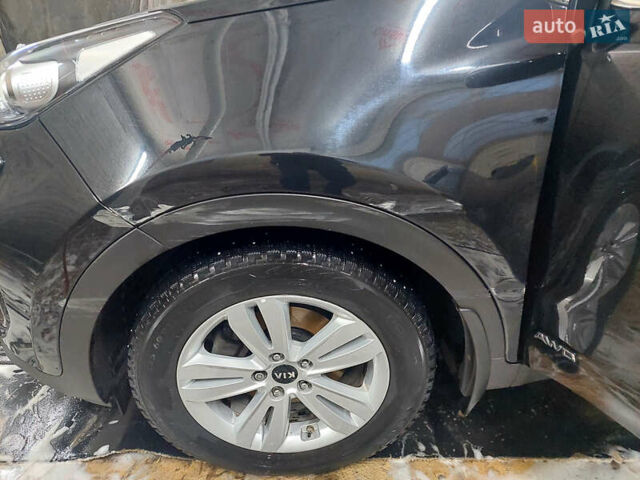 Чорний Кіа Sportage, об'ємом двигуна 2 л та пробігом 83 тис. км за 22000 $, фото 1 на Automoto.ua