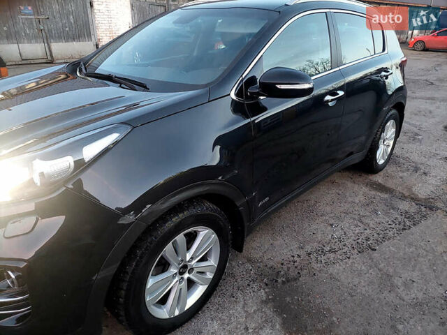 Чорний Кіа Sportage, об'ємом двигуна 2 л та пробігом 83 тис. км за 22000 $, фото 26 на Automoto.ua