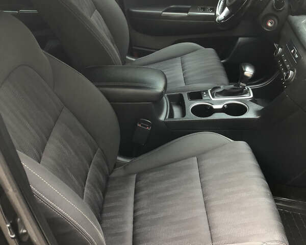 Чорний Кіа Sportage, об'ємом двигуна 2 л та пробігом 39 тис. км за 17800 $, фото 58 на Automoto.ua