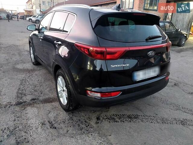 Чорний Кіа Sportage, об'ємом двигуна 2 л та пробігом 83 тис. км за 22000 $, фото 24 на Automoto.ua