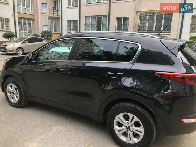 Чорний Кіа Sportage, об'ємом двигуна 2 л та пробігом 39 тис. км за 17800 $, фото 12 на Automoto.ua