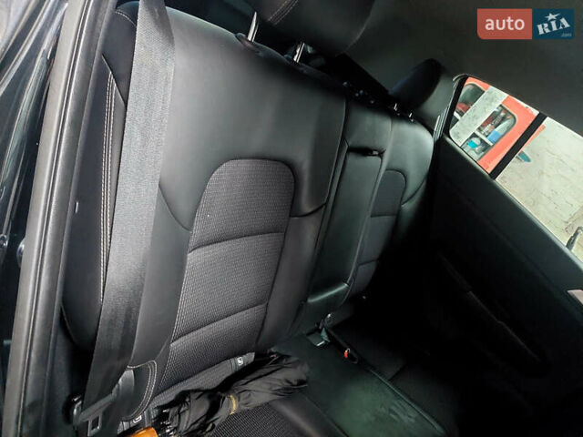Чорний Кіа Sportage, об'ємом двигуна 2 л та пробігом 83 тис. км за 22000 $, фото 10 на Automoto.ua