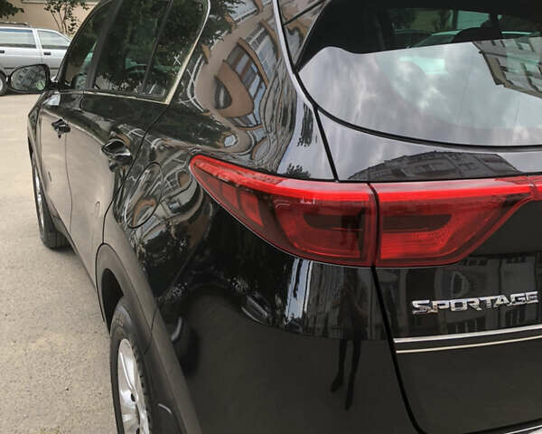 Чорний Кіа Sportage, об'ємом двигуна 2 л та пробігом 39 тис. км за 17800 $, фото 25 на Automoto.ua