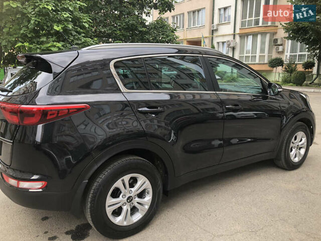 Чорний Кіа Sportage, об'ємом двигуна 2 л та пробігом 39 тис. км за 17800 $, фото 30 на Automoto.ua