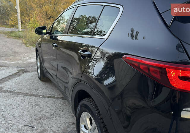 Чорний Кіа Sportage, об'ємом двигуна 1.69 л та пробігом 80 тис. км за 18500 $, фото 39 на Automoto.ua