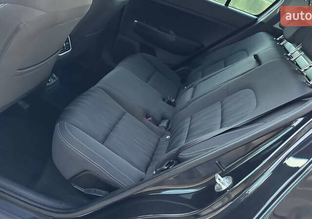 Чорний Кіа Sportage, об'ємом двигуна 1.69 л та пробігом 80 тис. км за 18500 $, фото 75 на Automoto.ua
