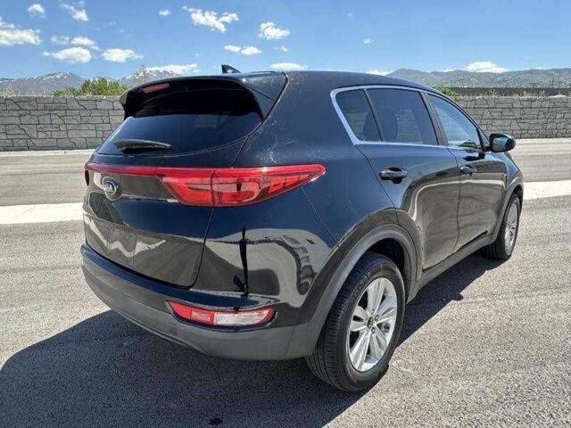 Черный Киа Sportage, объемом двигателя 2.4 л и пробегом 47 тыс. км за 3200 $, фото 2 на Automoto.ua