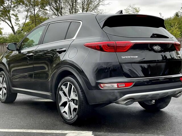 Черный Киа Sportage, объемом двигателя 2 л и пробегом 61 тыс. км за 7000 $, фото 5 на Automoto.ua