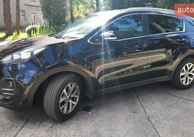 Черный Киа Sportage, объемом двигателя 2 л и пробегом 220 тыс. км за 18300 $, фото 1 на Automoto.ua