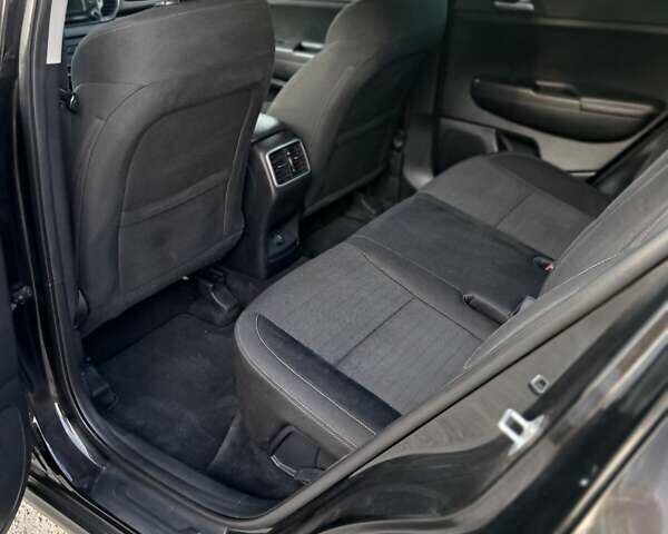 Черный Киа Sportage, объемом двигателя 2.4 л и пробегом 138 тыс. км за 15850 $, фото 7 на Automoto.ua