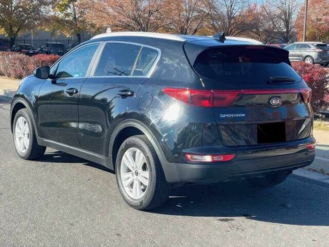 Черный Киа Sportage, объемом двигателя 2.4 л и пробегом 78 тыс. км за 10500 $, фото 4 на Automoto.ua